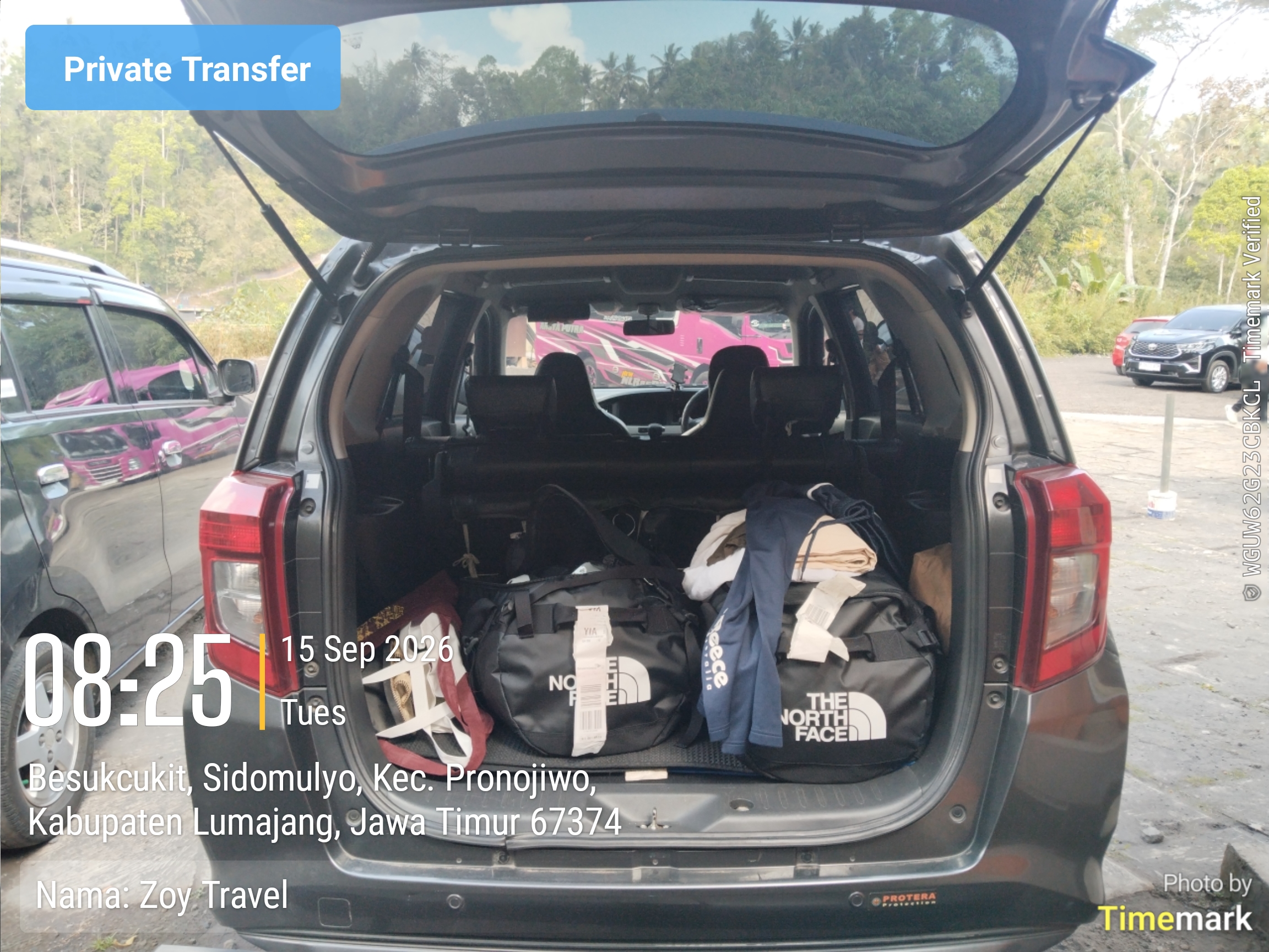 Travelers' luggage stored in the Zoy Travel vehicle during Tumpak Sewu exploration